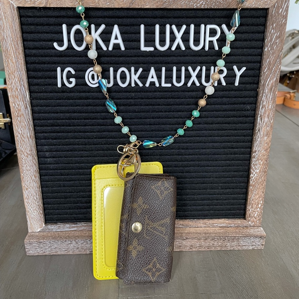 Louis Vuitton Monogram 4 key wallet with lanyard